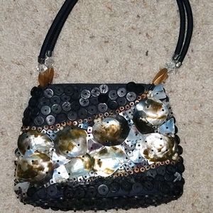 Handmade shell handbag hardly used